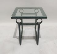 Modern coffee table with glass top and metal base