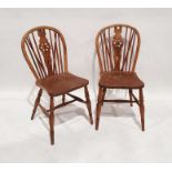 Two elm-seated wheelback chairs on turned front legs (2)