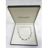 Silver and peridot necklace