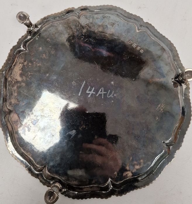 George III silver salver bearing armorial, raised on three feet, London 1768, maker I.C., 33cm - Image 3 of 4