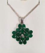 Silver and emerald pendant, quatrefoil-shaped, set multiple oval cut stones, on fine silver chain