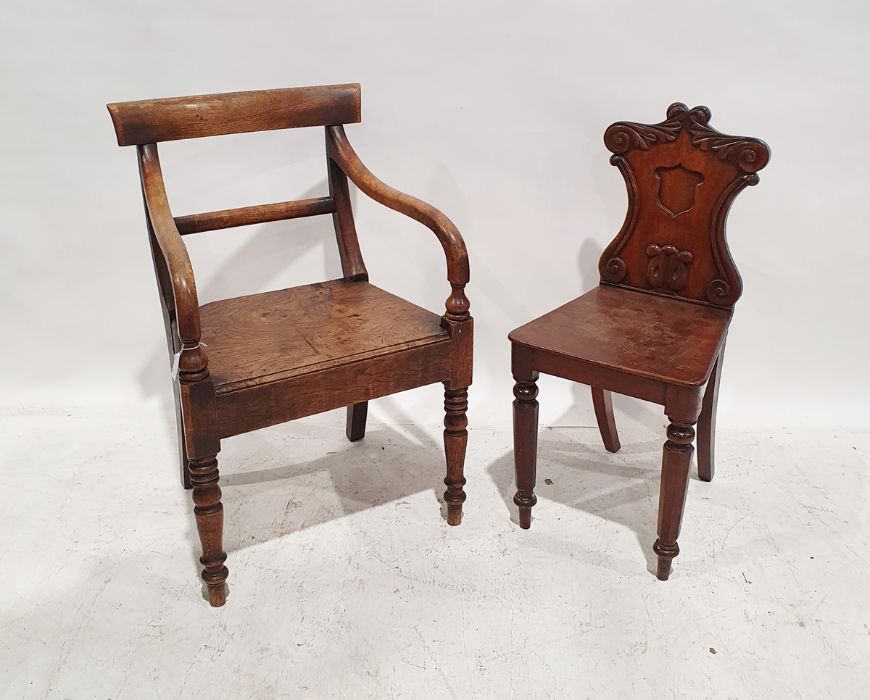 Elm-seated carver chair on turned front legs, possibly Georgian and a mahogany hall chair (2)