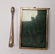 Silver bright cut pair of sugar tongs, marked GV and a silver photograph frame (2)