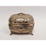 19th century continental silver-coloured bombe shaped tea caddy, indistinctly hallmarked to gilt
