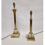 Brass corinthium column and onyx table lamp and a brass and onyx columned table lamp (2)