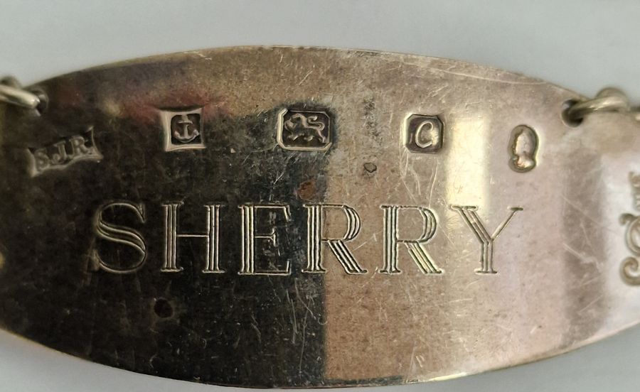 Silver octagonal powder compact with mirrored interior, a bottle label marked 'Sherry' for Queen's - Image 2 of 4