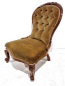 Victorian nursing chair with mahogany frame, mustard upholstered seat and back, on cabriole front