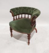 Victorian armchair with green upholstered back and seat, on turned and fluted front legs
