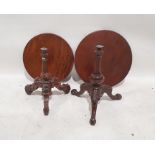 Two Victorian mahogany tripod tables with circular tops, moulded and turned columns, on cabriole
