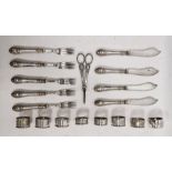 Silver and plated wares to include napkin rings and fish knives and forks (1 tray)