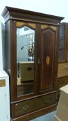 Early 20th century mahogany and satinwood inlaid two-door wardrobe, the moulded cornice above two