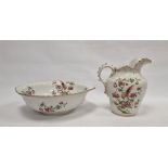 Staffordshire pottery ewer and basin decorated with exotic bird and rose branches