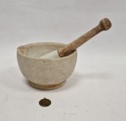 Vintage stoneware pestle and mortar 11cm x 18cm, and a Centanario Venafro 1904 medallion