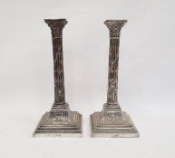 Pair Victorian silver table candlesticks, each of corinthian column form and applied with trailing