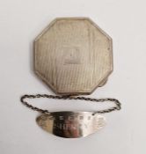 Silver octagonal powder compact with mirrored interior, a bottle label marked 'Sherry' for Queen's