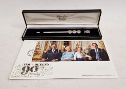 HM The Queen's 90th birthday first day cover stamps and a silver letter opener, 1.25oz