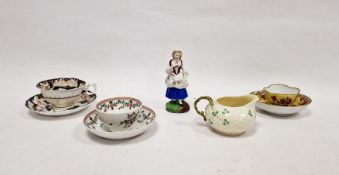 18th century porcelain tea bowl and saucer with floral swags, possibly Newhall, a Belleek clover