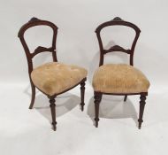 Set of four early 20th century dining chairs with mahogany frames, upholstered seat, on turned front