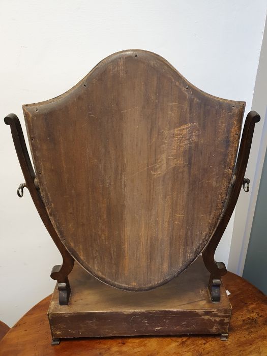 19th century mahogany shield-shaped dressing mirror with three drawers to the bowfront base, on ogee - Image 18 of 20