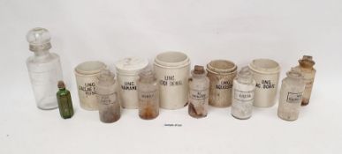 Assorted late 19th, early 20th century glass and ceramic apothecary jars.