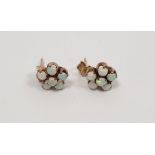 Pair of gold cluster opal earrings, not hallmarked Condition Reportone of the centre stones with