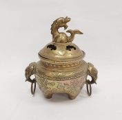 Chinese bronze censer and cover, the pierced low domed lid with dolphin finial and the body with