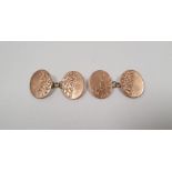 Pair 9ct gold rose gold chain-pattern cufflinks having floral engraved oval engraved oval ends, 8.5g