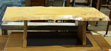 20th century coffee table formed as naturalistic plank, on two end supports, 37cm x 103cm x 38cm