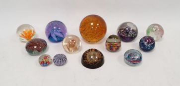 Collection of glass paperweights to include Caithness "Cauldron Aqua", Caithness "Myriad", a Sanders