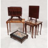 20th century walnut nest of three tables, a magazine rack, a two-tier coffee table, a folding table,