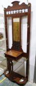 Late Victorian/early Edwardian umbrella/coat hall stand with mirrored back, brass coat hooks,