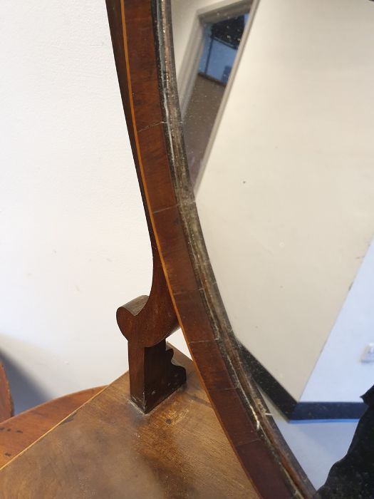 19th century mahogany shield-shaped dressing mirror with three drawers to the bowfront base, on ogee - Image 9 of 20