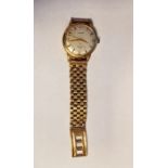 9ct gold gentleman's wristwatch with silver dial and baton hour markers, second sweep hand,