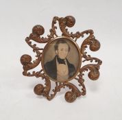 Nineteenth century miniature on paper, half-length portrait of Victorian gentleman in black