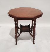 Edwardian walnut octagonal occasional table with moulded edge, on turned and ring supports,