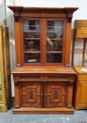 Victorian mahogany Irish-style cabinet with moulded cornice above two glazed doors enclosing