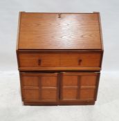 Mid-century modern Parker Knoll teak bureau with single drawer and pair cupboard doors, on plinth