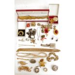 Two boxes of costume jewellery to include gold-coloured chains, necklaces, etc