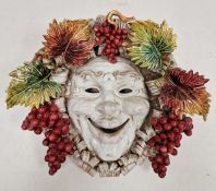 Perseo pottery Bachanalian wall mask with smiling face and fruiting vine, 42cm high x 44cm wide