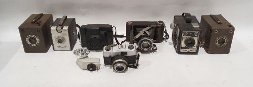 Box of assorted vintage cameras to include a Kodak camera with Kodak flash holder in original box,