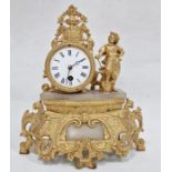 Gold painted brass and alabaster timepiece with foliate detailing and blacksmith figure to the right