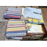 Box of assorted linen and fabric to include tea towels, rugs, bedsheets, etc