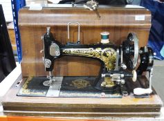 Vintage Frister & Rossmann sewing machine with wooden case