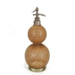 Vintage BA&Co London double-gourd-shaped soda syphon with cane fretwork exterior