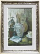 Eirene Jackson  Oil on board "Green Still Life One", still life with vases and books, signed lower