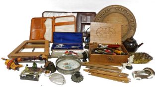 Silver-plated spoon and fork set in leather case, a wooden letter rack, various items of treen,