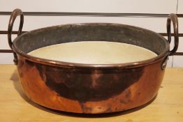 Large antique copper two-handled shallow pan, 40cm diameter x 17cm deep Condition Report Wear