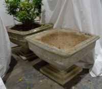 Pair of composite stone urns of square form, 41cm high approx. (2)