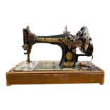 Singer sewing machine with wooden case, serial number Y3567046