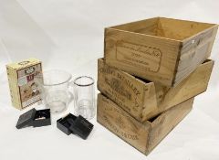Three wooden champagne boxes by Phelan Segur, Chateau Batailley and Chateau du Moulin Noir, a